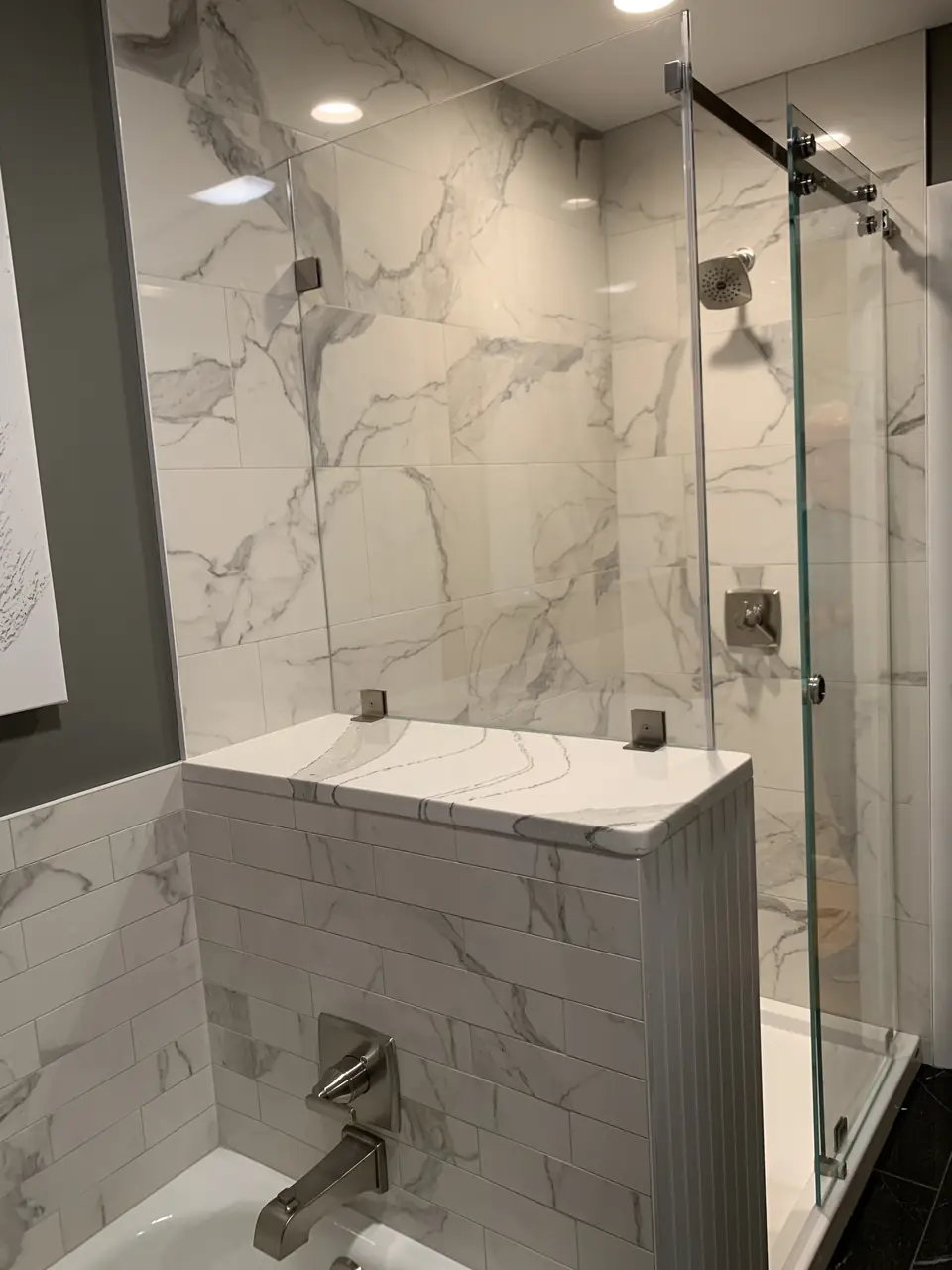 Half-wall glass shower