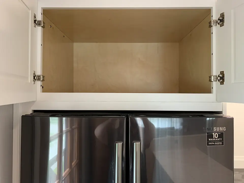 Cabinet above the fridge